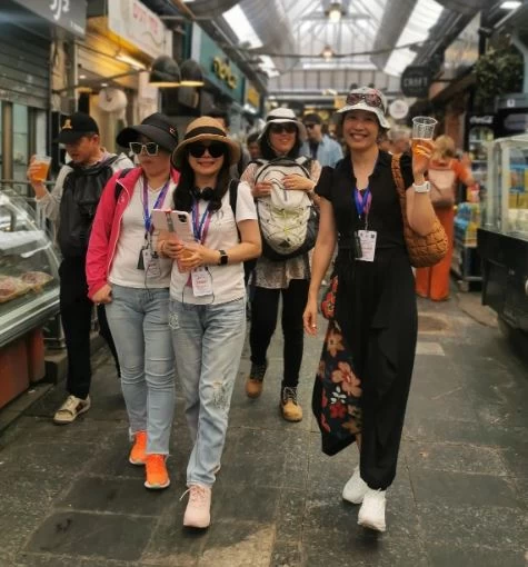 Guiding Chinese Tourists On A Tasting Food Tour At Machine Yehuda Market Jerusalem